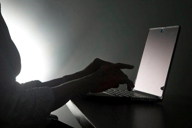 Person working on a laptop