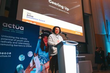 Andrew Jamison of UBC Geering Up accepts the Actua 2022 Award for Excellence
