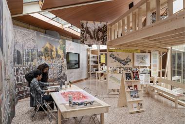 Students working inside AAHA's "Not for Sale!" exhibit, installed at the Canadian pavilion in Venice. Photograph by Maris Mezulis