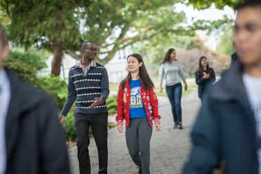 Engineering student and staff walk along Main Mall at UBC Vancouver. Photo credit: Paul H. Joseph / UBC Brand & Marketing