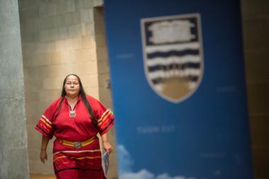 Indigenous person preparing for graduation ceremonies