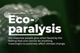 A close-up of a plant with beads of water in the background, covered in white font that defines eco-paralysis as the response people give when faced by the feeling that one cannot do anything meaningful to positively affect climate change