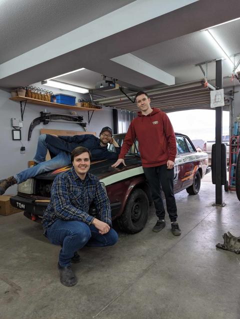 Alumni get-together building a "racecar"